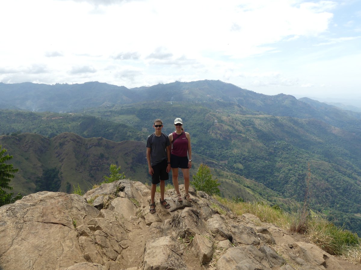Noah and Line at the Ella Rock summit with the valley behind