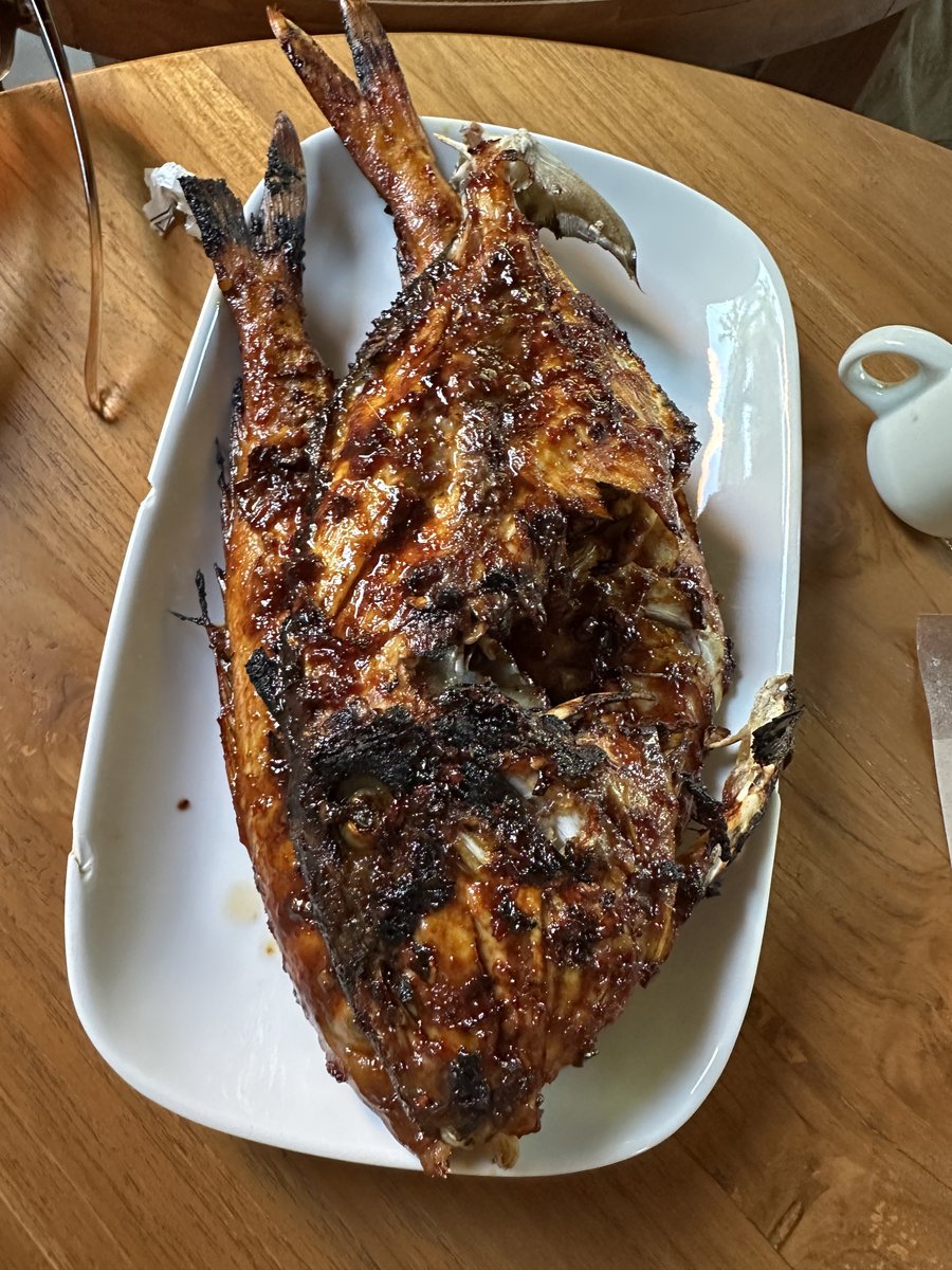 One of the grilled fish plated up at the Horny Crab restaurant