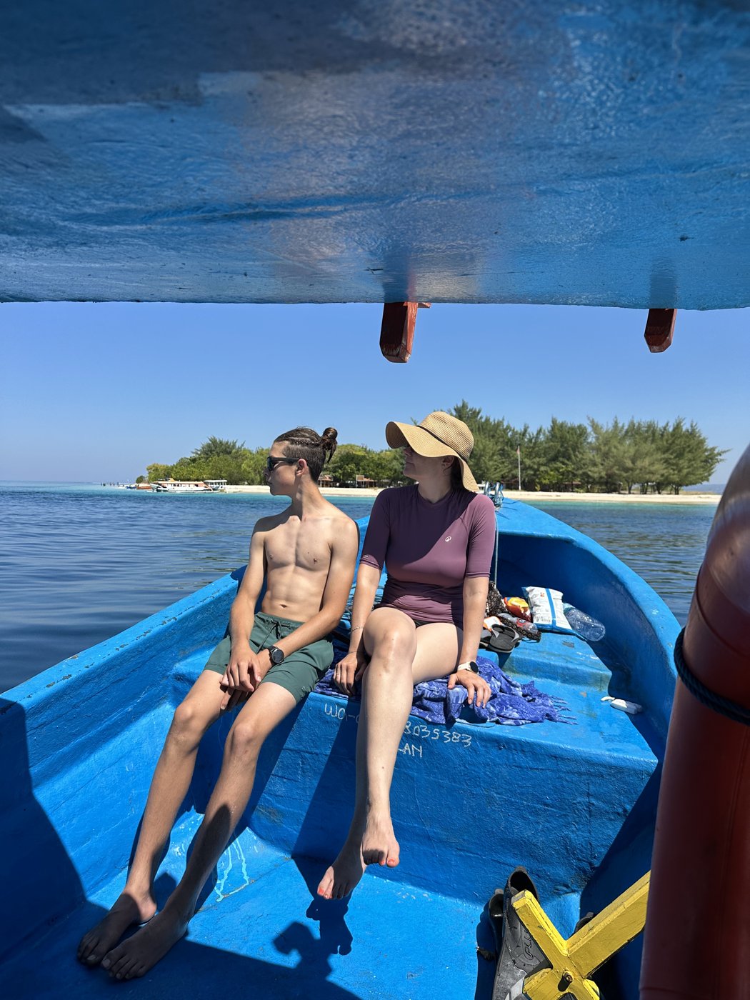 The family relaxing on the boat