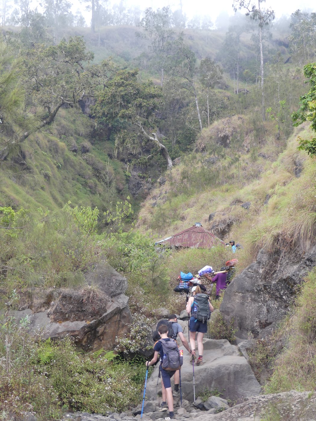 The family climbing the trail