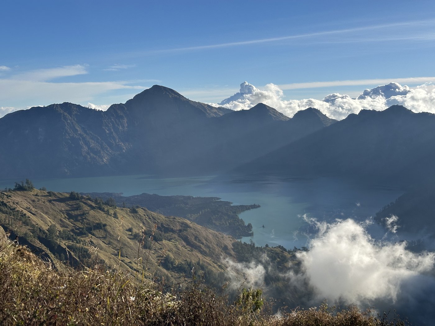Jesper and Noah at the Rinjani summit with the sign