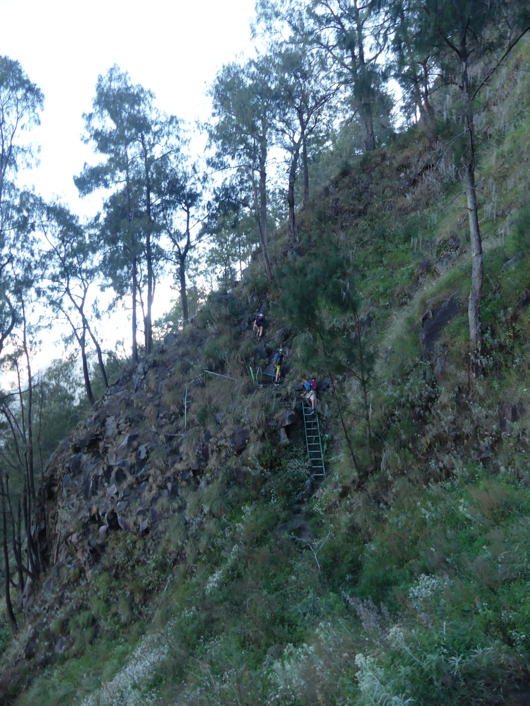 Climbing the narrow gully up the crater wall