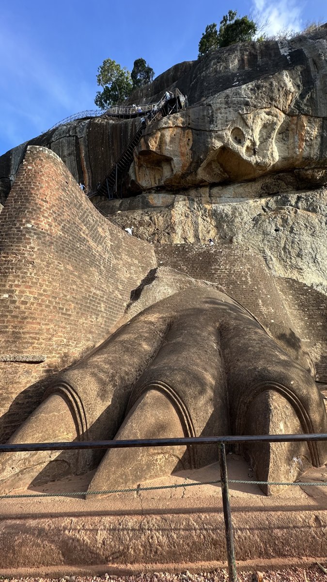 The giant carved stone Lion's Paw at the base of the final Sigiriya staircase