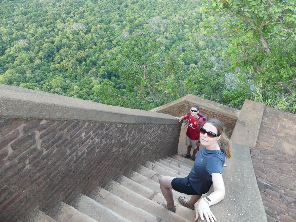 Line and Noah on the ancient brick summit staircase high above the jungle canopy